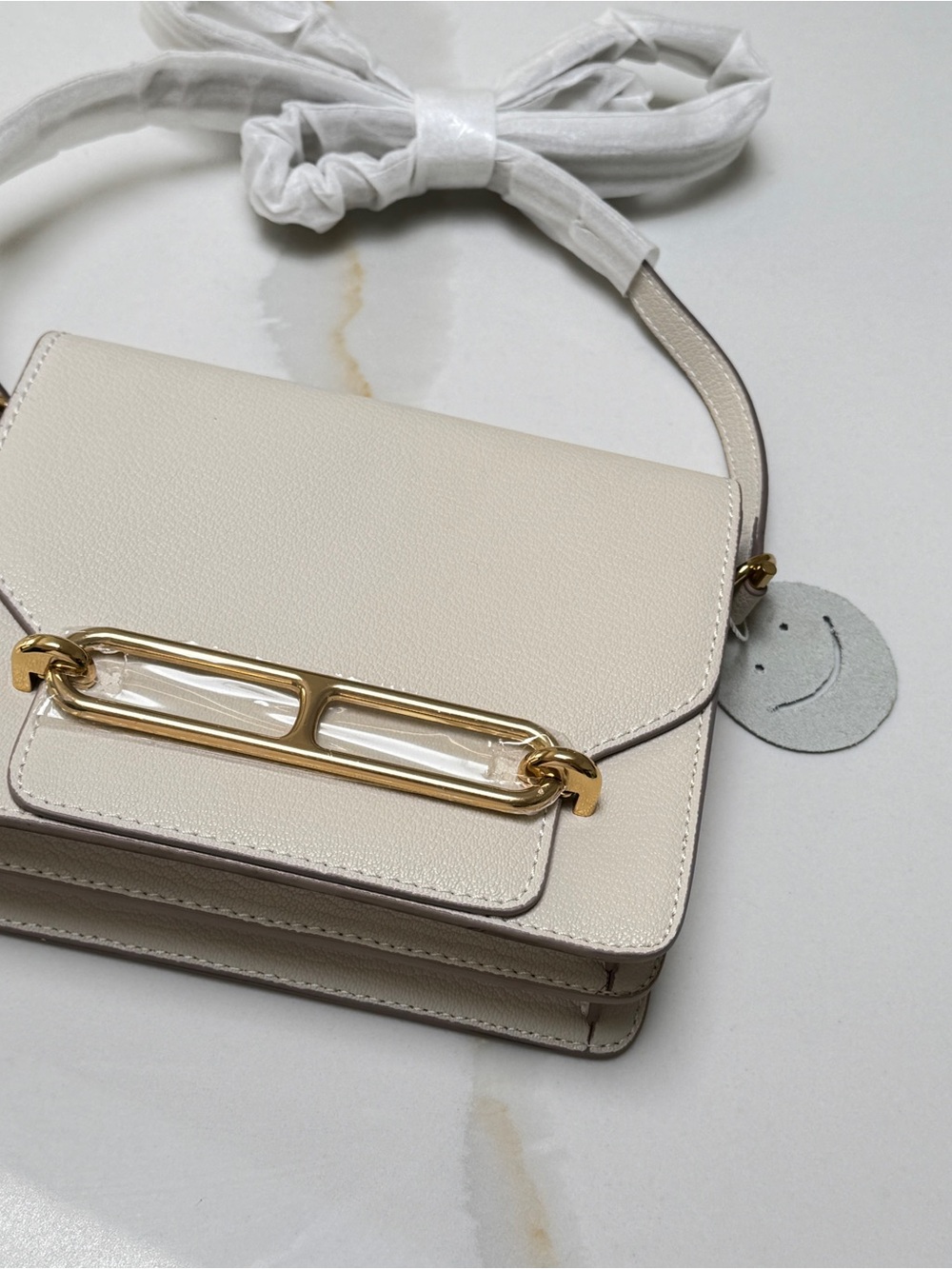 Cream Leather Crossbody Bag with Gold Bar Accent